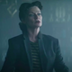 Michelle Gomez wears a black and white striped shirt under a black blazer in a still from Doom Patrol season 3.